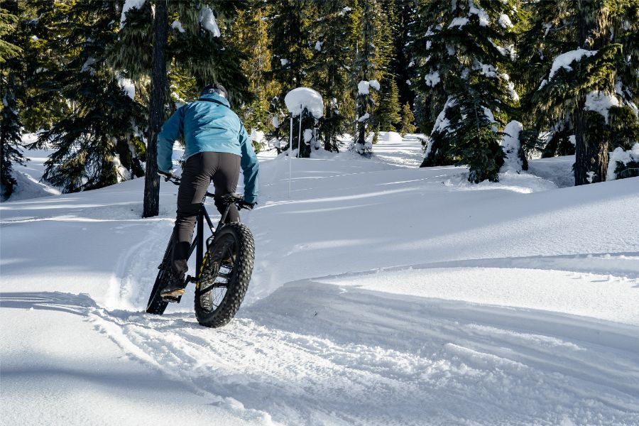 mountain biker on fat bike in winter