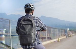 commuter riding with backpack