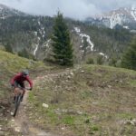 owenhouse cycling bike rental customer riding in the mountains of bozeman montana