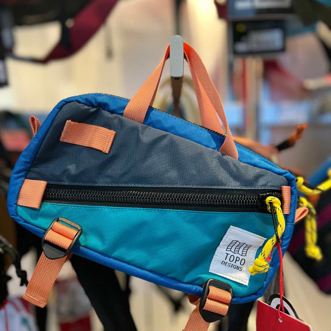 Topo-designs-bag. Blue and green with front zipper.