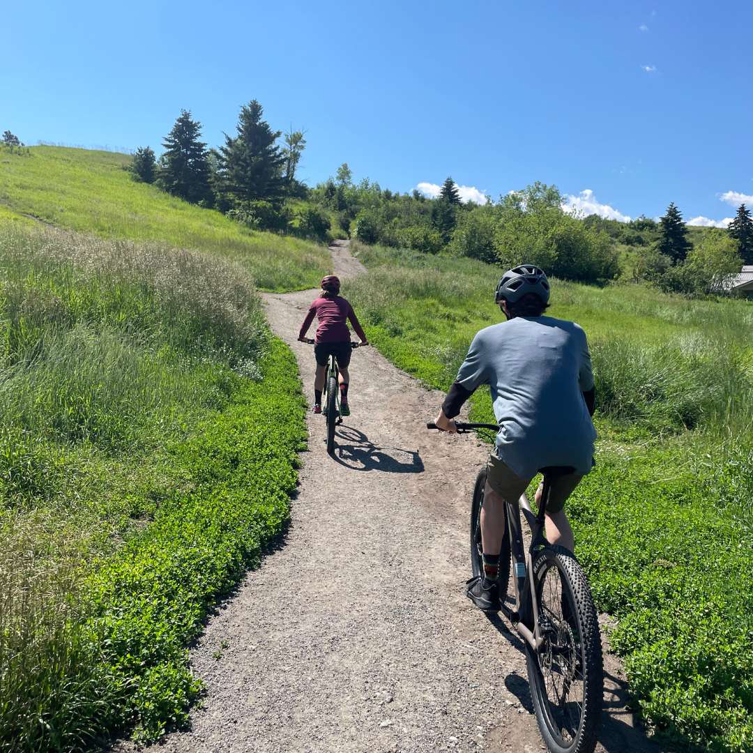 two riders on mountain bikes at peets hill in Bozeman, montana