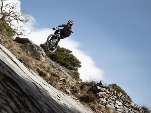 a mountain biker catching air on a santa cruz bronson