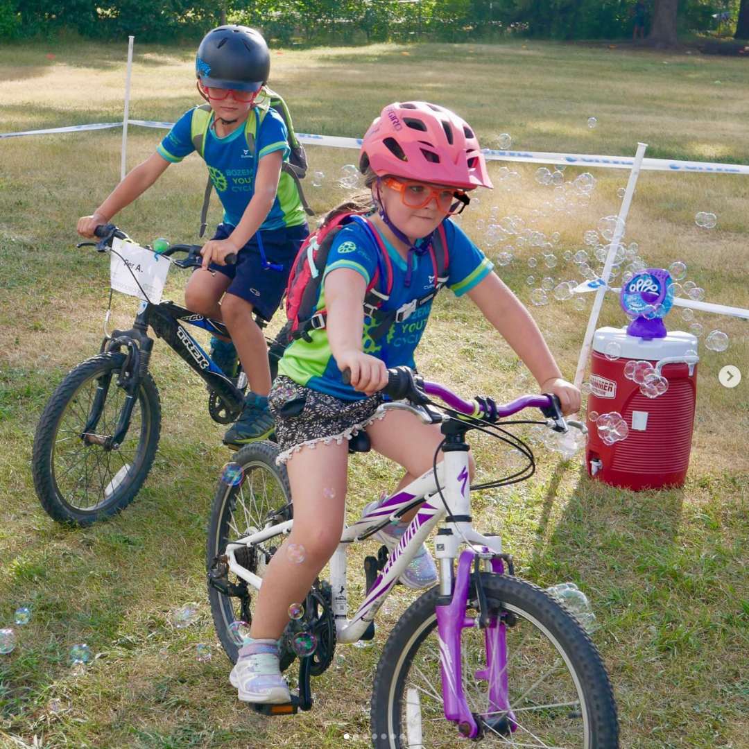 kids on bikes wearing Giro helmets