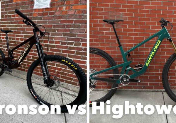 bronson bike on right hightower on right photographed in front of brick wall with words "bronson vs higtower" in white font