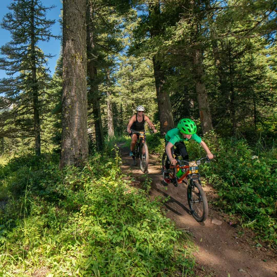 3 (32) (1) mom and son on a mountain bike trail in bozeman