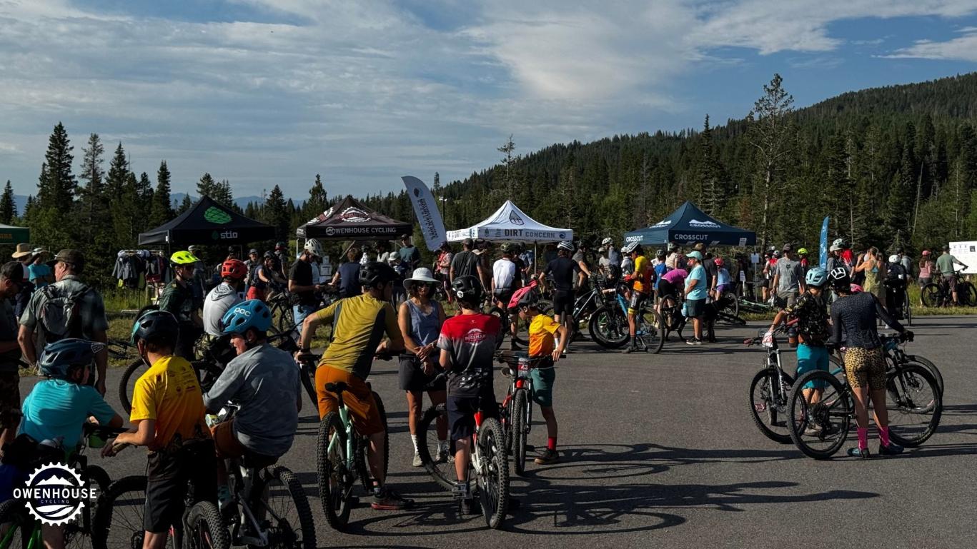 Cyclists gathering at The Hoot mountain bike event near Bozeman